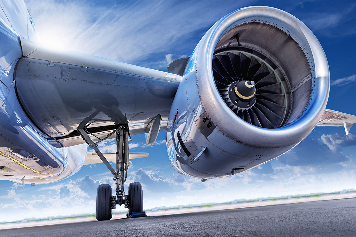 Image of a plane engine wheels and wing