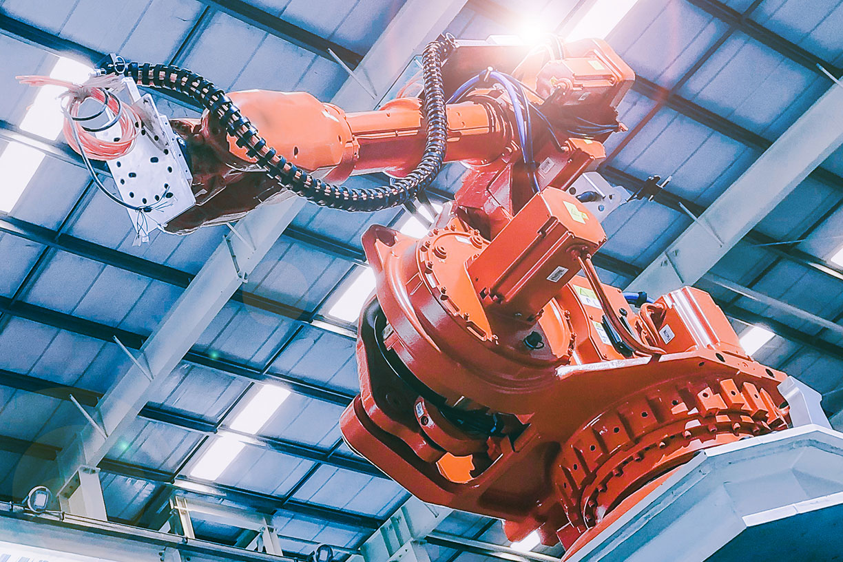 Orange industrial robot arm