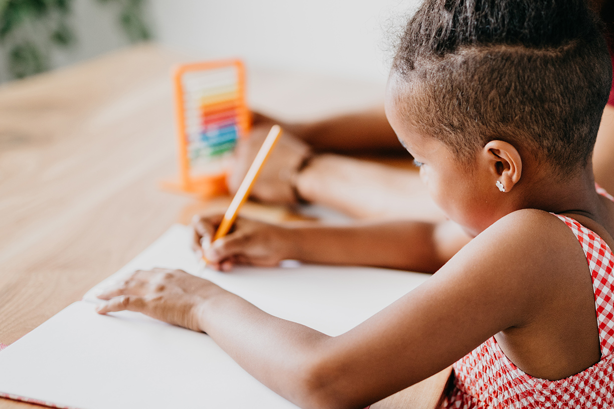 Children learning at a desk