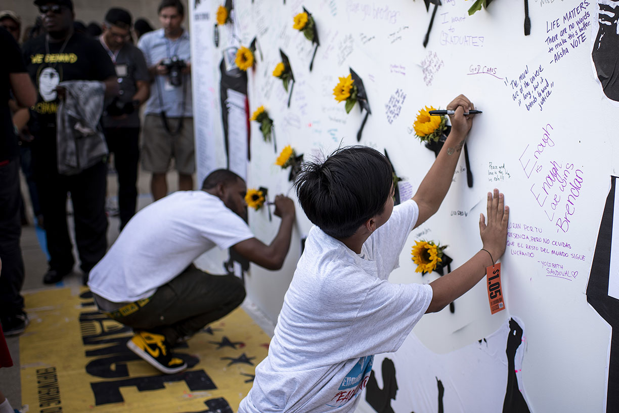 Boy signing wall