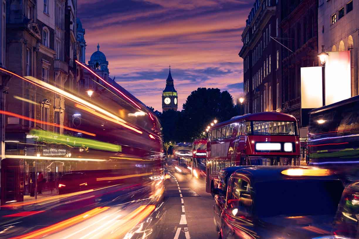 London Big Ben from Trafalgar Square traffic lights at sunset