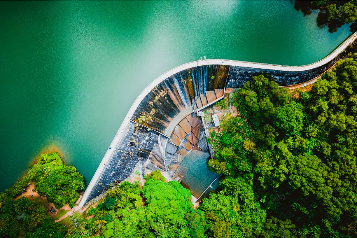 Aerial image of dam with trees