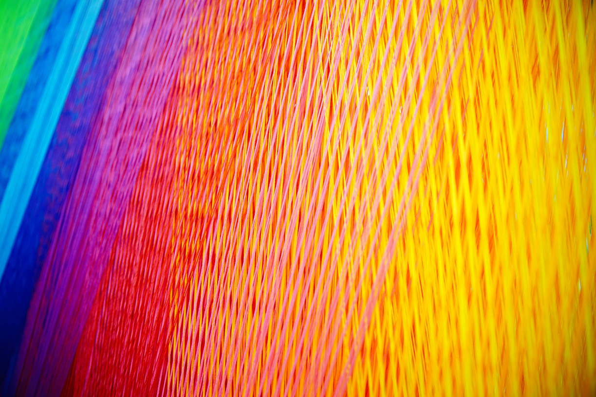 Rainbow of interwoven yarn