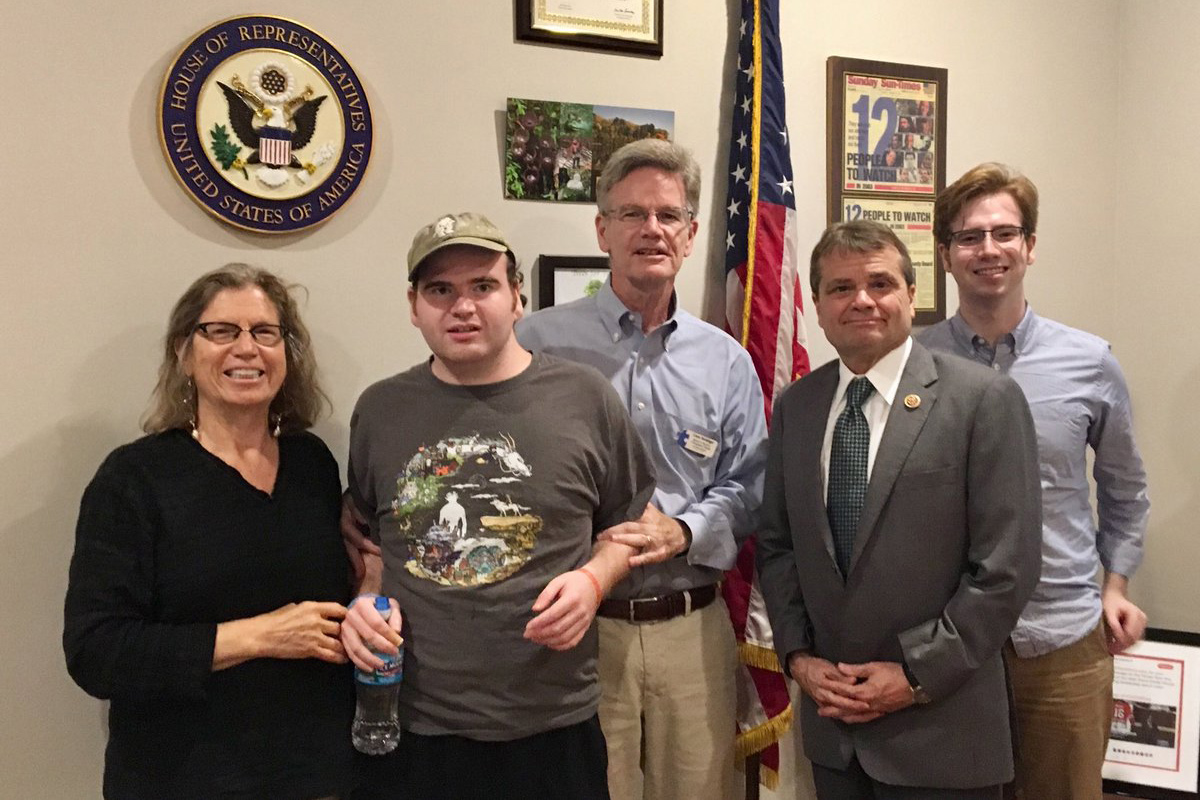 Group of people standing in office