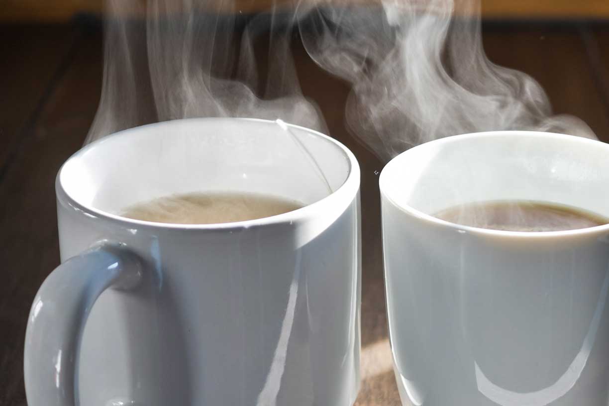 Two cups of hot coffee