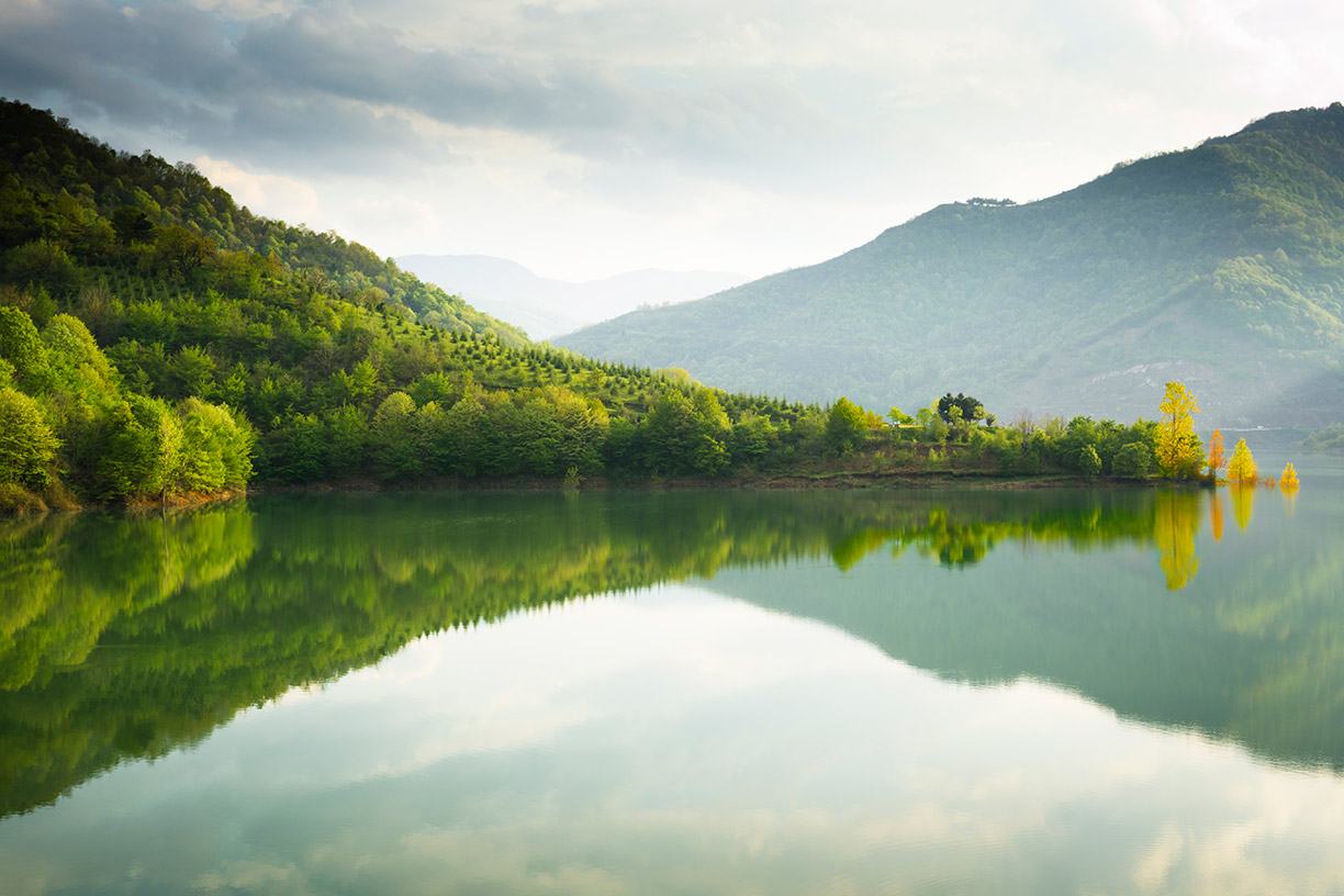 Lake and green hills