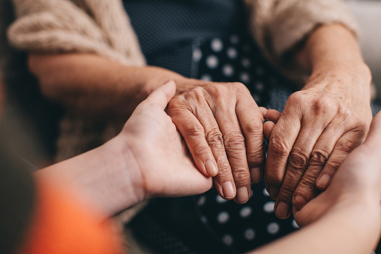 Holding loved ones hands