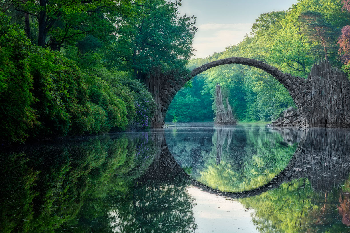 Circular bridge reflecting on water