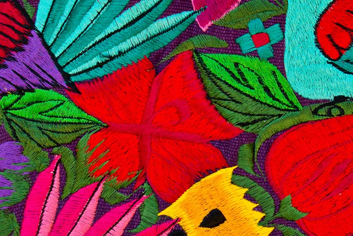 Close up of tapestry in bright colors